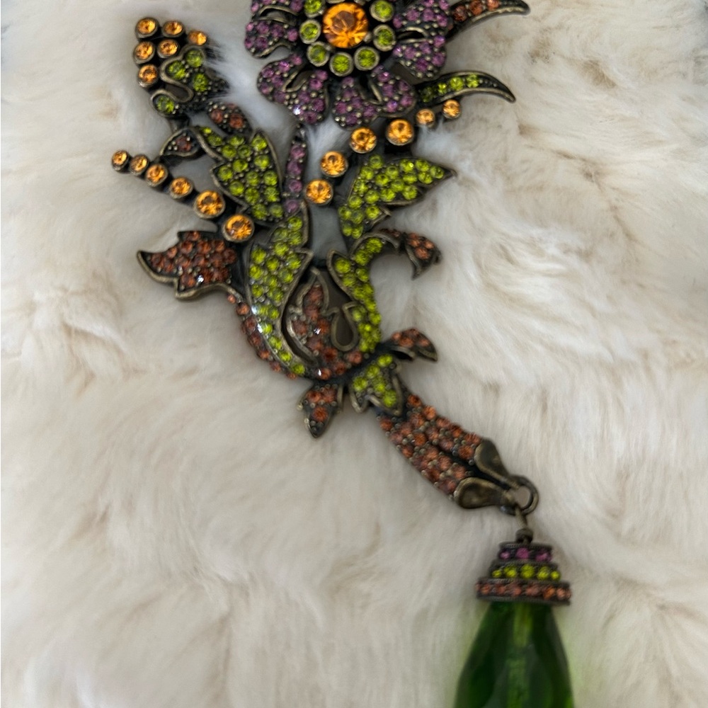 Heidi Daus Purple and Green Brooch with Elegant Design